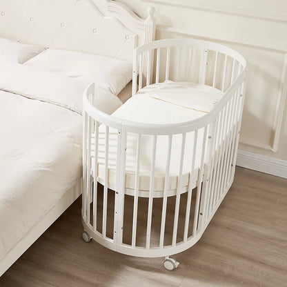 Oval crib Multifunctional pine children's bed European white newborn baby movable splicing bed